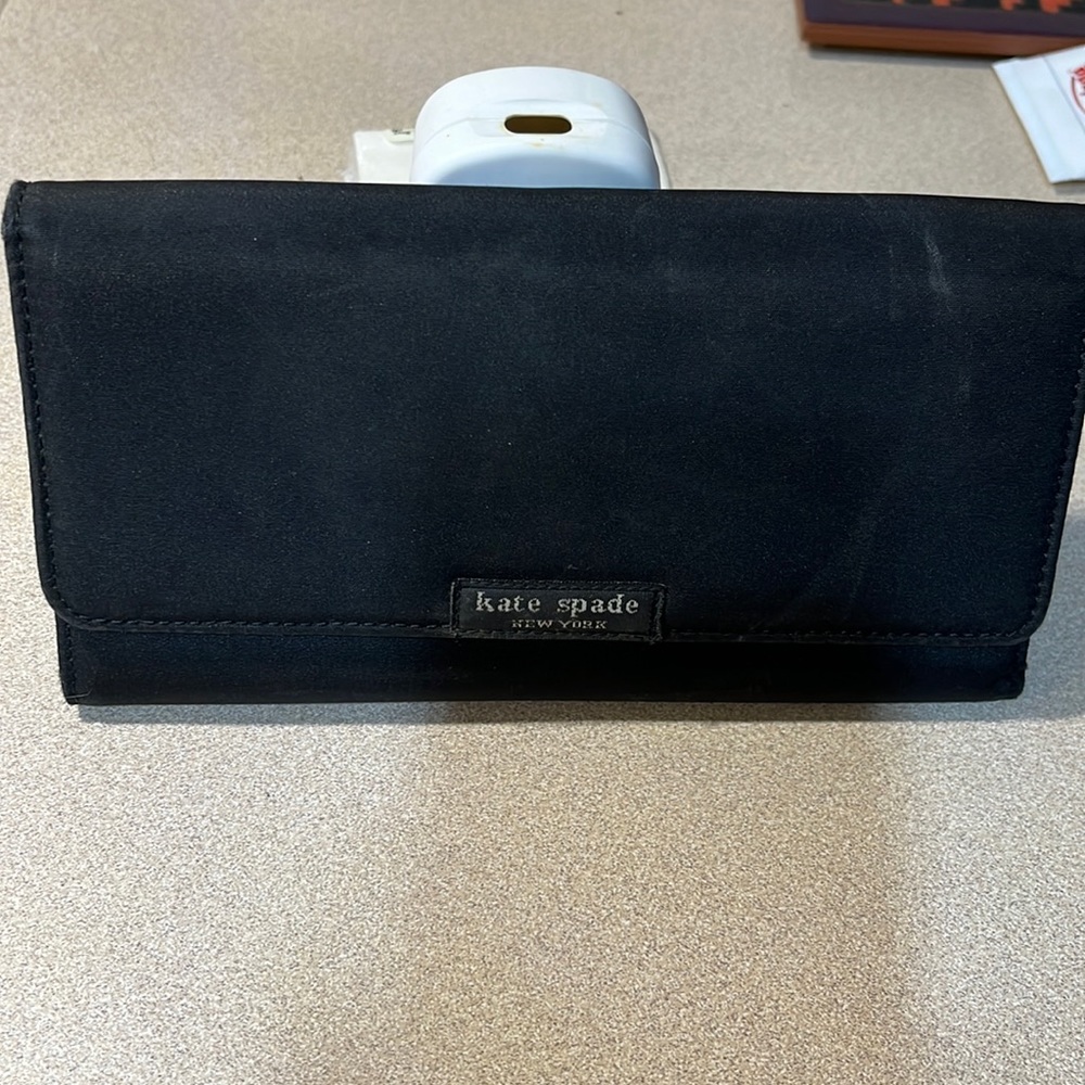 Kate Spade black tri-fold women’s bifold.